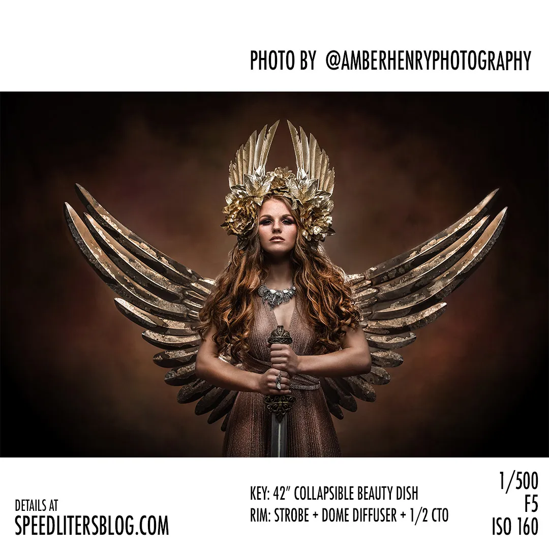 Woman in a golden crown with large metal wings holding a sword, dramatic fantasy portrait by Amber Henry