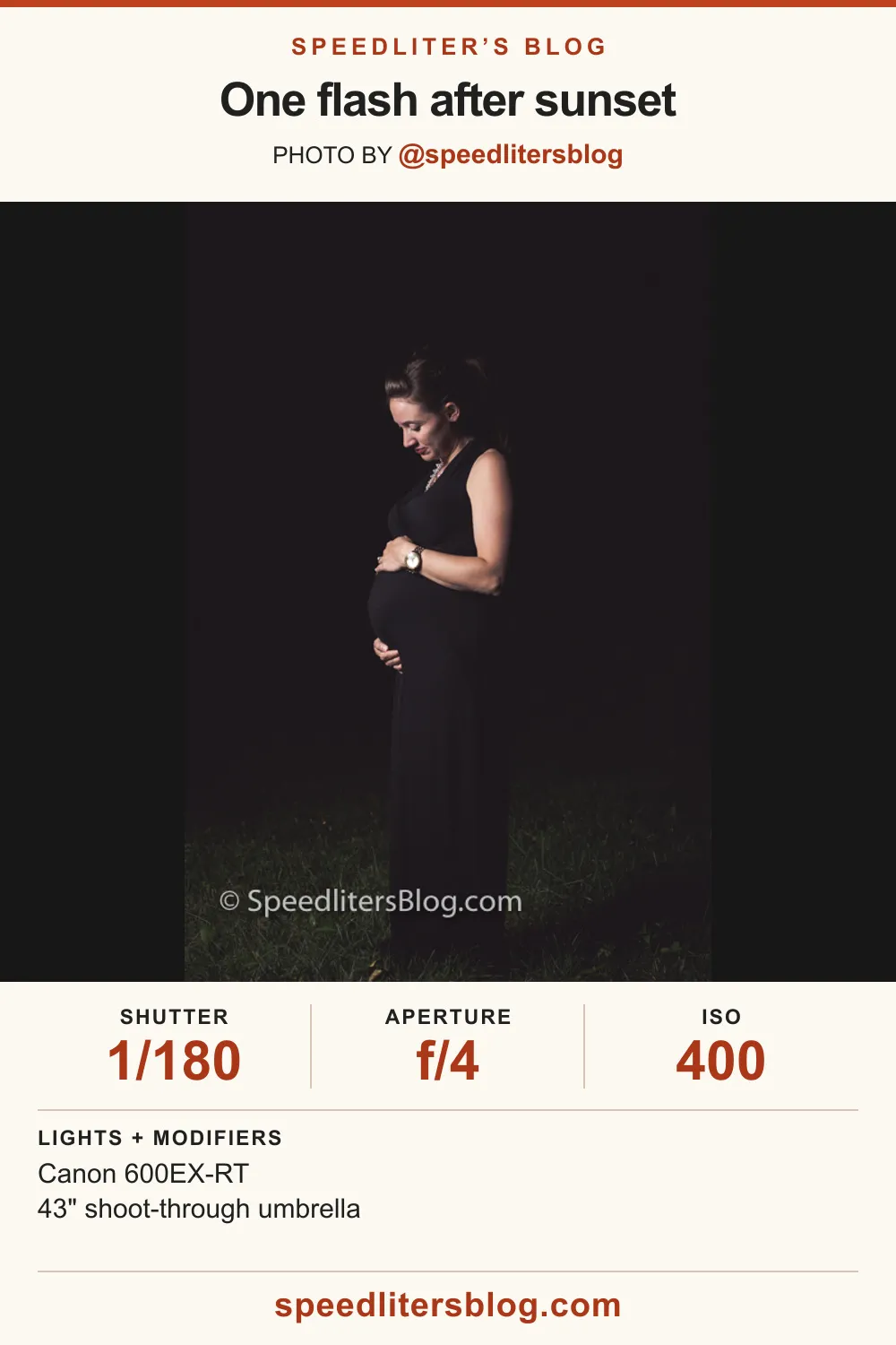 Pregnant woman in a black dress cradling her belly at dusk, lit by one speedlite