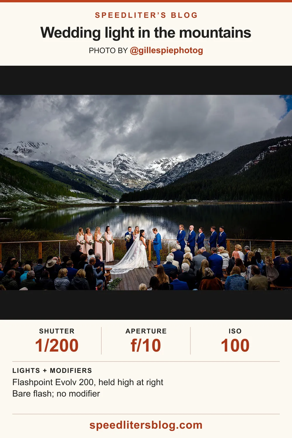 Wedding ceremony on a lakeside deck below snowy Colorado mountains, by Gillespie Photography