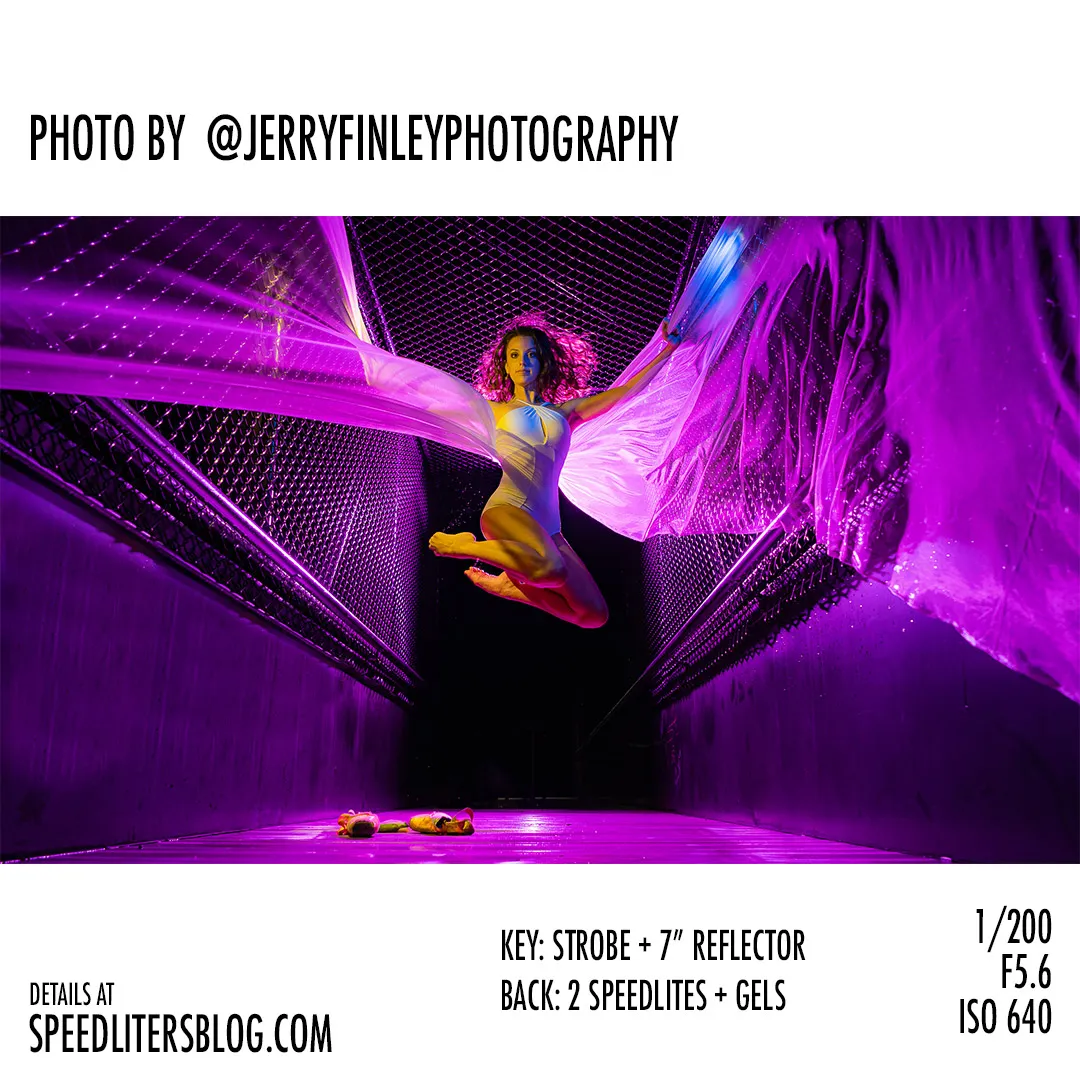 Dancer leaping on a footbridge with purple fabric flowing behind her, by Jerry Finley