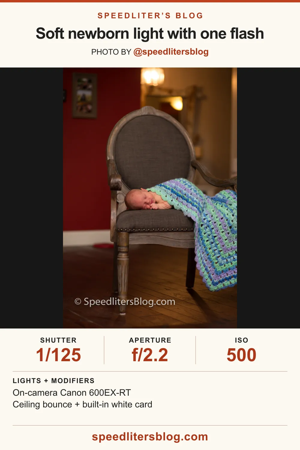 Newborn sleeping on an upholstered chair under a crocheted blanket